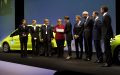 Anniversario dei 125 anni Mercedes con Angela Merkel in giacca rossa