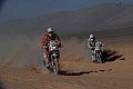 Dakar 9 stage - moto 184 KTM 450 Rally EXC del turco Sakir Senkalayci / moto 56 Yamaha 450 YZF del francese Merard Jaen Christophe