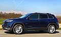 Jeep Cherokee Limited MY 2014 su strada vista laterale