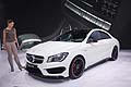 Mercedes-Benz CLA 45 AMG and model at the New York Auto Show 2013