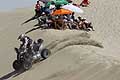 Dakar 2013 IV tappa - quad che affronta le dune del deserto
