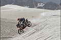 Dakar 2013 11° stage La Rioja - Fiambalá moto KTM con atterragio della ruota anteriore sulle done di sabbia