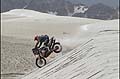 Dakar 2013 11 stage La Rioja - Fiambal moto KTM con atterragio della ruota anteriore sulle done di sabbia