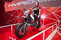 Ragazza e Ducati Hypermotard alla 70^ edizione dellEicma 2012 di Milano