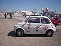 Una curiosa Fiat 500 con le immagini di topolino per il mondo Disneyland presente al raduno Giannini allAutodromo del Levante