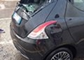 Vettura Lancia distrutta dalla grandine nei pressi di Leroy Merlin presso il Centro Commerciale di Casammassima in Puglia