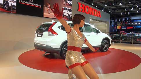 Honda - A rider takes the U3-X for a spin on the Honda stand at the Moscow International Automobile Salon 2012