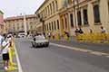 Triumph TR 3 Sport Works del 1957 con il driver Hans ABRAHAMS (USA) e codriver Aaron BENDIKSON (USA) alla Mille Miglia 2021, controllo del cartellino a Reggio Emilia con il numero di gara 401, sull sfondo l'Obelisco