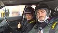 Linviato di automania Gianlica Maxia e il pilota Vitantonio Liuzzi per il test drive Nissan al Bolonga Motor Show 2012 nel Nissan R Day