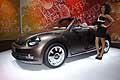 Volkswagen Magiolino Cabriolet e hostess in anteprima europea al Motor Show 2012