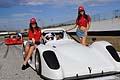 Le sexy ragazze del paddock vicino alla monoposto Radical SR3 Suzuki in pit line per la finalissima Formula