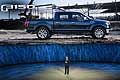 Bill Ford, Executive Chairman unveiling the Ford F 150 Raptor at the Detroit Auto Show 2015