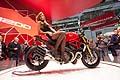 Ragazza su moto Ducati Monster 1200S in anteprima allEicma 2013. Sexy girls in moto con galze sfilate...