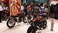 Moto stand SWM e piloti in tuta allEicma 2014