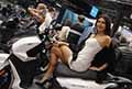 Sexy Hostess Marialaura De Vitis su Scooter SYM Joyride 16 300 allEicma 2021 di Milano presso Fiera Rho