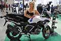 Hot Sexy ragazza bionda Giulia Boffini in sella ad una bike Bmw allEicma 2021 di Milano, Salone Internazionale del Motociclo