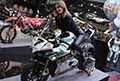 Moto Ducati da gara e Sexy hostess Francesca Ghilardi all´Eicma 2021 di Milano il Salone Internazionale del Motociclo
