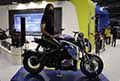 Moto Ottobike Ovaobike e ragazza con mascherina allEicma 2021 al Salone Internazionale del motociclo di Milano - Fiera Rho