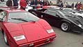 Esposizione esterna con le supercar Lamborghini Countach rossa e nera che anno fatto la storia della casa del Toro alla Fiera di Padova 2012 - Auto e Moto dEpoca