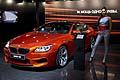 Girl vicino alla BMW M6 kyne al MIAS 2012