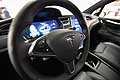 Tesla Model X dettaglio volante e interni con cruscotto ad alta tecnologia al Motor Show 2016 di Bologna