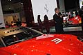 Manager della gestione sportiva Ferrari con la supercar Ferrari 599XX al Motor Show di Bologna 2011