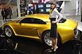 Hostess e presentratrice dello stand con la supercar Willys AW380 berlinetta by Viotti al Motor Show di Bologna 2014