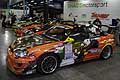 Vetture motorsport Orange nellarea Paddock al Motor Show di Bologna 2014 per la 39^ edizione