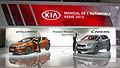 Anteprime mondiali stand Kia Motors con la Kia Carens grey e Kia Pro Ceed al Paris Motor Show 2012