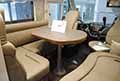 Carthago Liner For Two - Iveco Daily I 53 L tavolino e divani interni al Salone del Camper 2024 presso Fiere di Parma