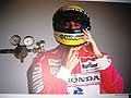 Ayrton Senna con il casco nel team McLaren, nella mostra fotografica per il Tributo Ayrton Senna a Imola