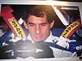 Mostra fotografica in ricordo di Ayrton Senna, senza casco nellabitacolo della monoposto
