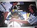 Mostra fotografica in ricordo di Ayrton Senna, nella monoposto con i tecnici che si confrontano
