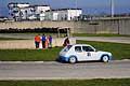 Peugeot 205 Rallye del pilota Esposito Andea sullo sfonto l�Autodromo gremito di gente per la 3^ Prova Turismo Fino a 1600 per il Trofeo Autodromo del Levante 2014 sul circuito di Binetto