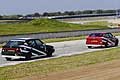 Alfa Romo 33 di Gaudenzi Domenico dietro di lui Natalini Sergio in gara alla prima tappa del Trofeo Autodromo del Levante 2015, foto in memoria di Sergio