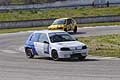 Peugeot 106 Rallye Cozzolino secondo seguuto da De Leonardis al tornantino al II Trofeo Autodromo del Levante, categoria Monomarca Peugeot N1400