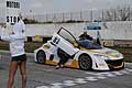 Ragazza Pit line e la Renault Megane Troph categoria Turismo oltre i 1600 al Trofeo Autodromo del Levante 2015 sulla pista di Binetto