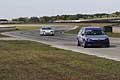 Vetture racing di testa sul Curvone 2 in gara nella categoria Turismo fino a 1600 per la 2^ prova del Trofeo Autodromo del Levante 2015