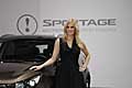 Kia Sportage affiancata da affascinante bionda al Salone di Ginevra 2010
