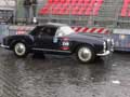 LANCIA Aurelia B24 (1955) equipaggio Dora (IT) - Vaccari (IT) alle Mille Miglia 2010, pronti per la ripartenza da Roma sotto la pioggia