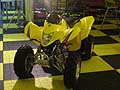 Moto Racing Paddock Show. Quad Suzuki giallo esposto al Motor Show di Bologna 2009