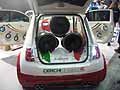 Team e scuderie, accessori e aftermarket per auto. Fiat 500 Tuning cofano posteriore con spettacolari subwoofer al Motor Show 2009