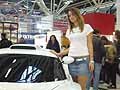 Team e scuderie, accessori e aftermarket per auto. La Supercar � la sexy modella in minigona di jeans al Motor Show di Bologna 2009