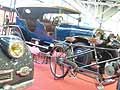 Auto d'epoca e bicicletta diposto depoca al Motor Show di Bologna 2009